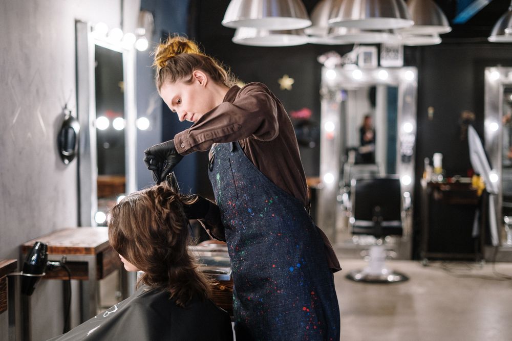 A stylist working through a dimensional colour application